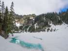 Washington, USA. Mount Baker Snoqualmie NF, Lake Lilliam, partially melted out from winter snow. Art Print